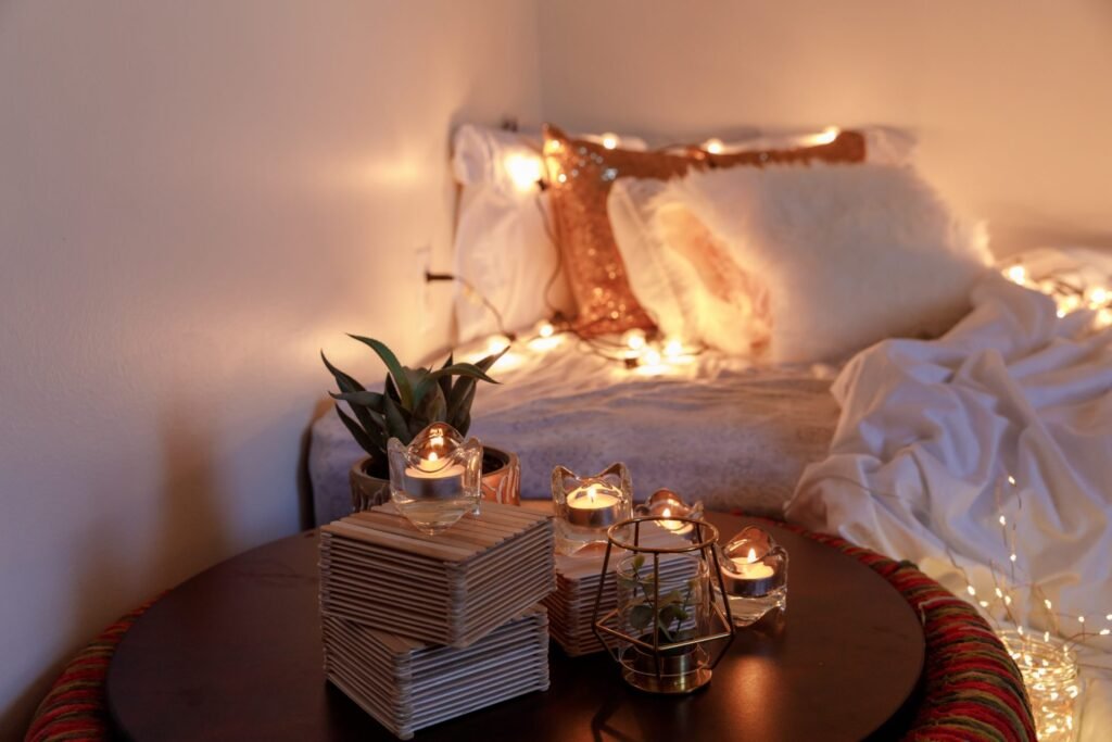 Cozy indoor setup with candles and blankets demonstrating hygge practice to cope with winter depression Beawareofmecom Cozy indoor setup with candles and blankets demonstrating hygge practice to cope with winter depression