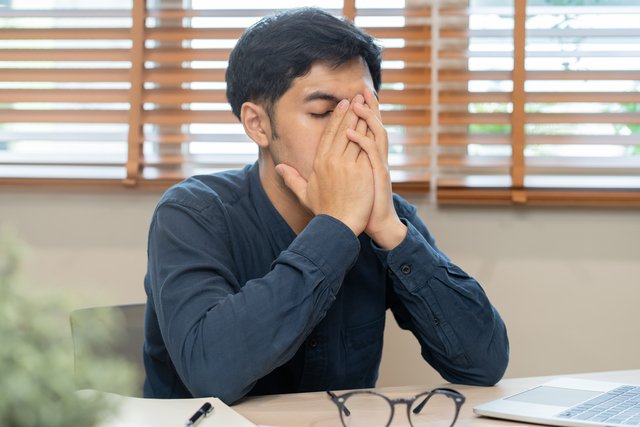 Entrepreneur exhausted hand of stress asian young business man Beawareofmecom Burnout Quotes