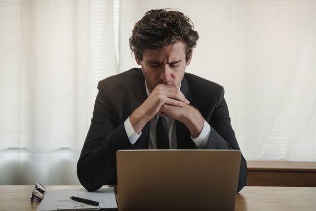 Employee exhausted stressed caucasian young business man holdin Beawareofmecom Burnout Quotes