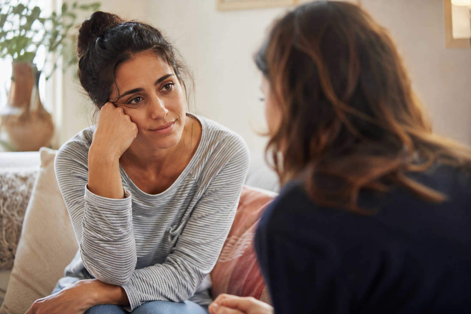 Person reflecting on when financial anxiety may need extra support